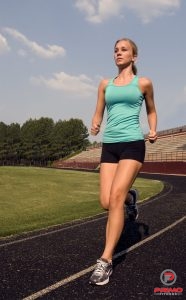 15312-a-young-woman-jogging-outdoors-pv