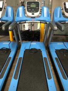 Custom powder blue frames on these treadmills