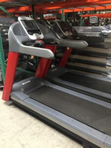 Custom red frames on these treadmills